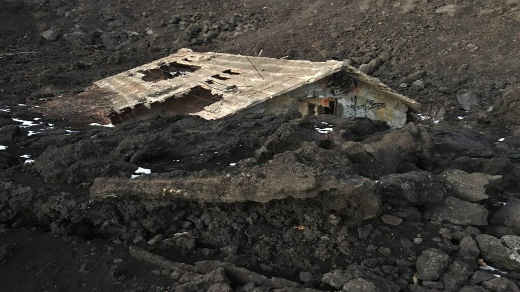 Brown house destroyed by black mud